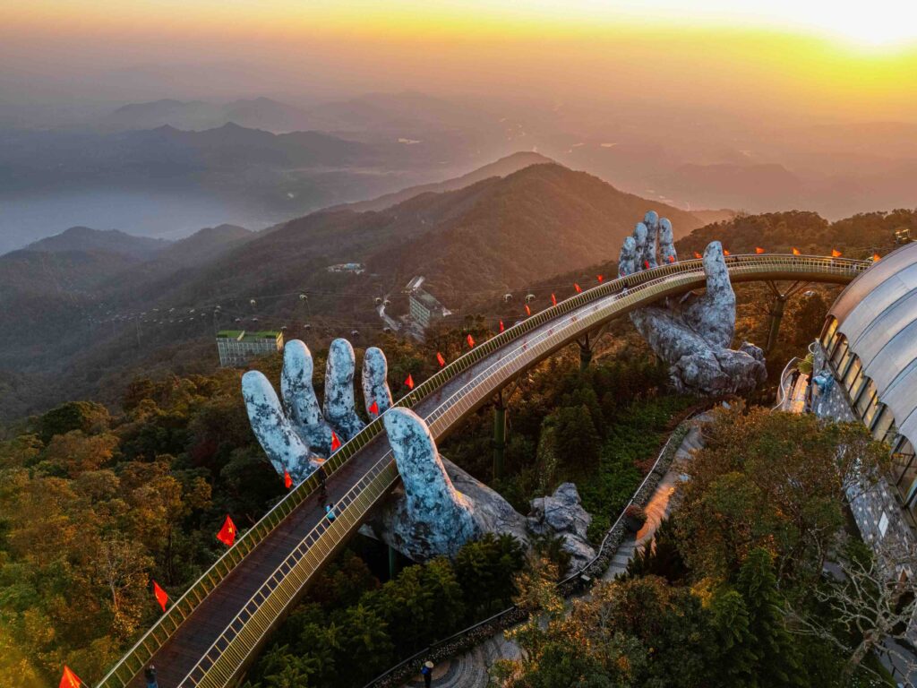 First Time in Vietnam: What Most Travelers Don’t Expect Golden Bridge held by giant stone hands at Ba Na Hills, first time in Vietnam travel guide