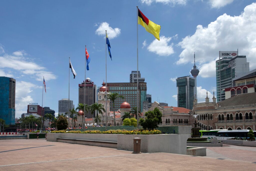 Kuala Lumpur: The Heart of Modern Malaysia and Its Vibrant Culture Sultan Abdul Samad Building at Merdeka Square with KL Tower behind, Kuala Lumpur, Malaysia