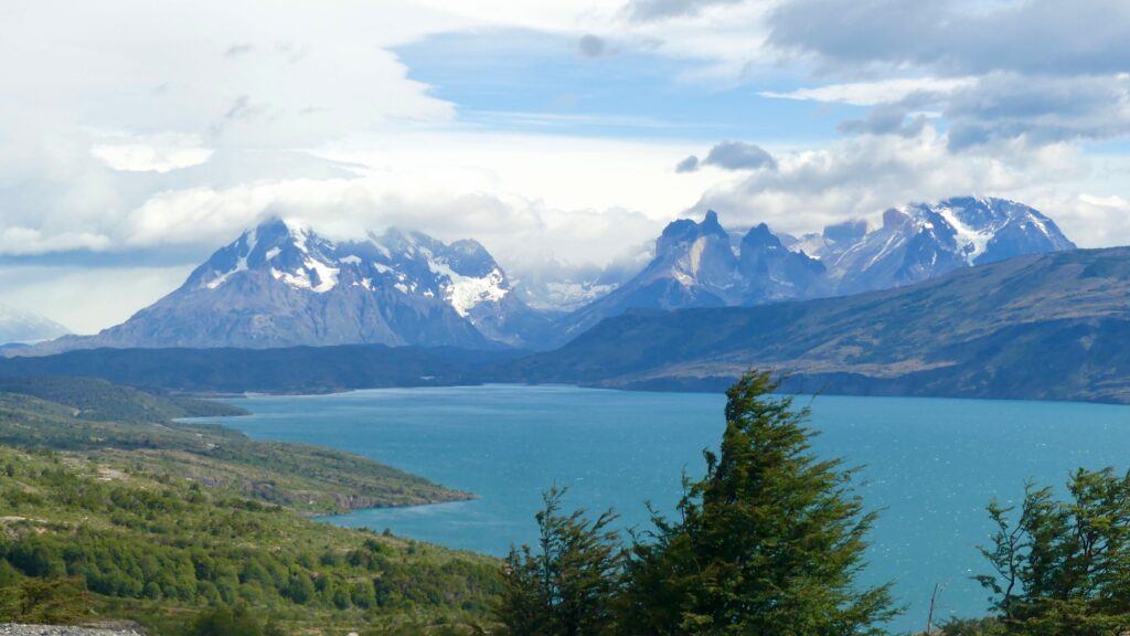 Chile Travel Guide: Best Things to Do, Must-See Places, and Top Tips for First-Time Visitors Torres del Paine mountains and lake in Chile, a travel guide to the best must-see places.