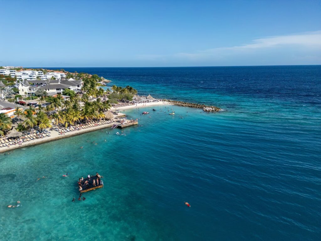 Best Snorkeling in the Caribbean & Key West (2026): Tropical Escapes An aerial view of snorkeling spots in the Caribbean sea