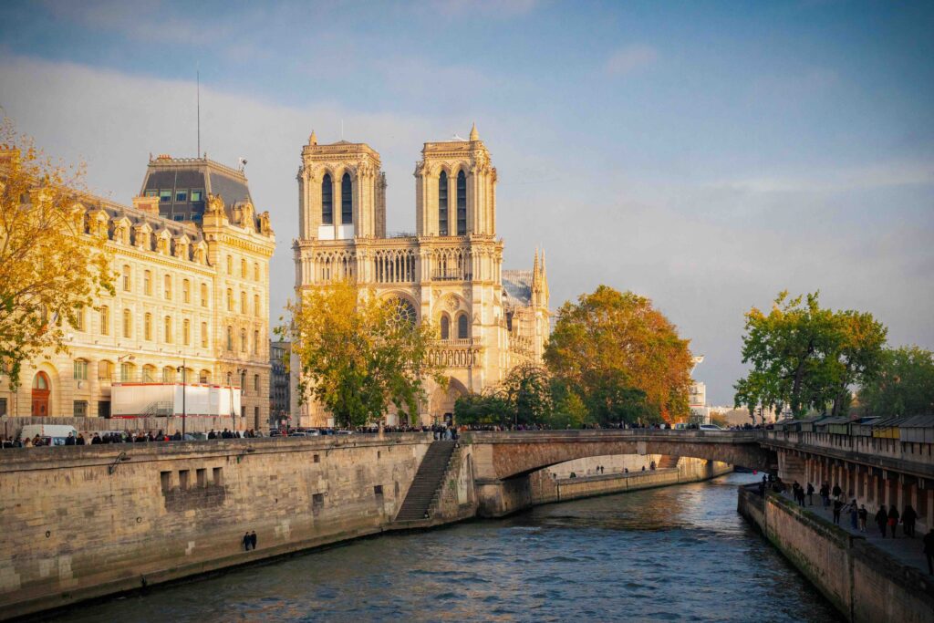 What to Do in Paris (2026): 45+ Best Things & Top Tourist Attractions Notre-Dame Cathedral above the Seine in warm autumn light, a top Paris tourist attraction.