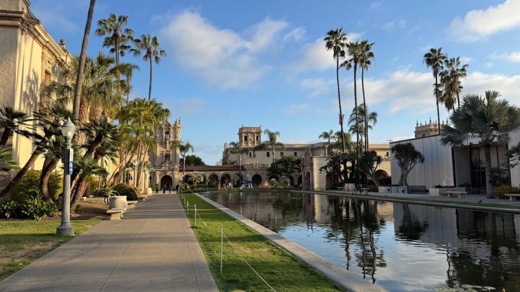 Reflecting pool and Spanish architecture in Balboa Park, offering scenic kid-friendly activities