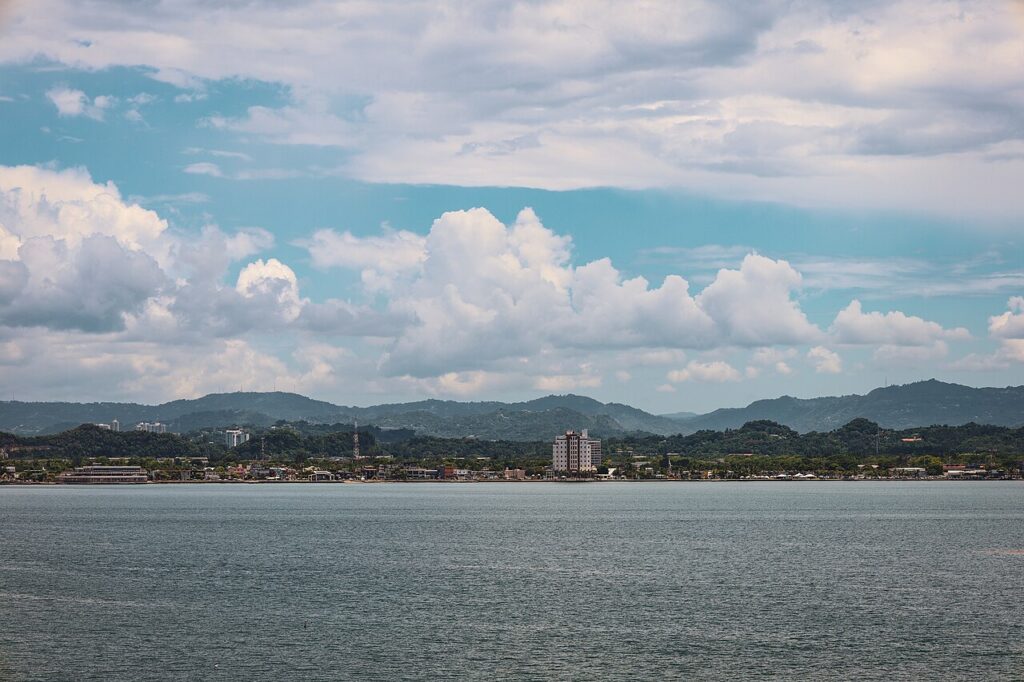 View of Cataño across the water with mountains in the background. 