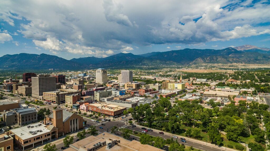 Aerial view of downtown Colorado Springs, a hub for many Colorado vacation spots. 
