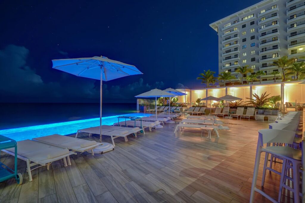 Nighttime pool at Condado Ocean Club, one of puerto rico all inclusive resorts adults only 