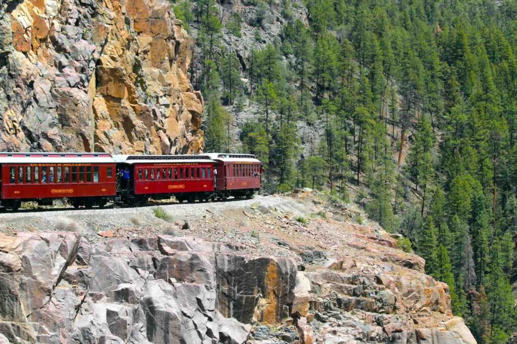 The Durango train on a cliff, memorable among the best places to visit in Colorado. 