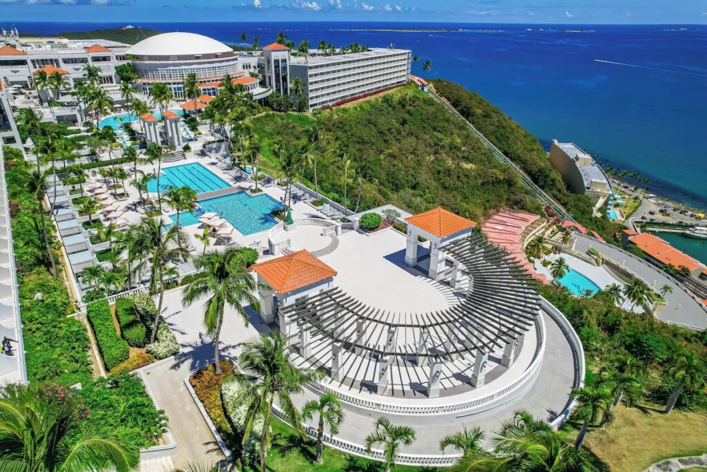 Aerial pool view at El Conquistador, top among puerto rico resorts for families 2026 
