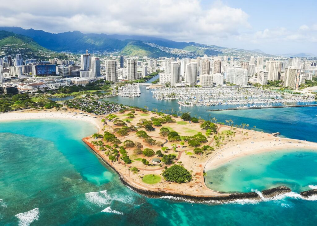 Aerial view of Honolulu's beaches and parks, making it one of the best family vacations in the us