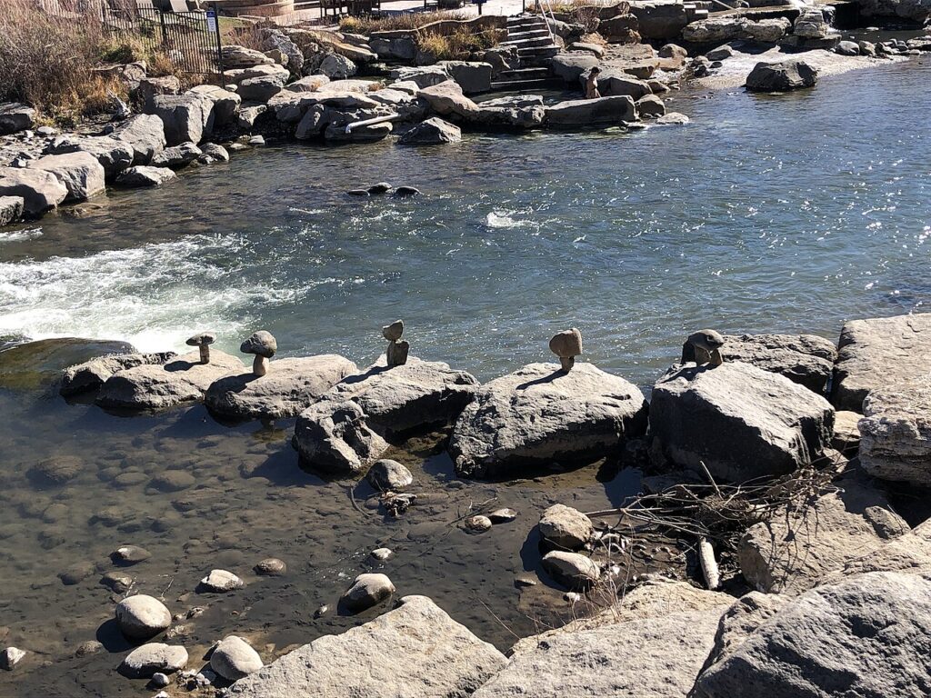 Stepping stones arranged in the shallow, flowing water of the San Juan River. 