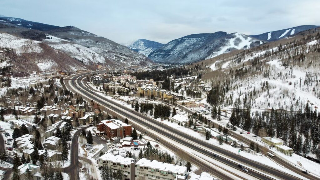 I-70 highway in snowy Vail, a top choice among Colorado vacation spots. 