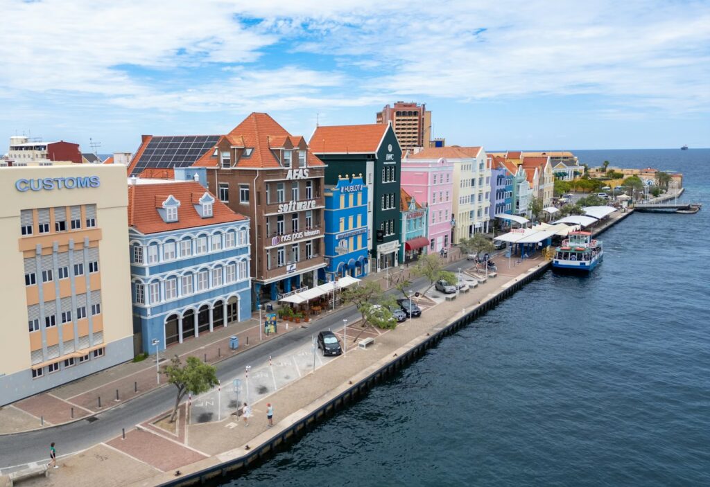 Colorful waterfront buildings in Willemstad, Curacao, a vibrant spot on the best caribbean islands to visit 