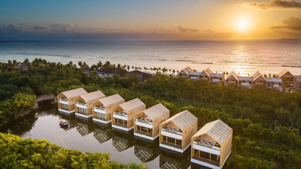 Stunning overwater villas at Banyan Tree Mayakoba, offering ultimate privacy among top luxury resorts in Mexico.