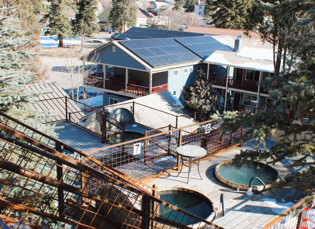 Private redwood hot tubs on a hillside at Box Canyon Lodge and Hot Springs in Ouray. 