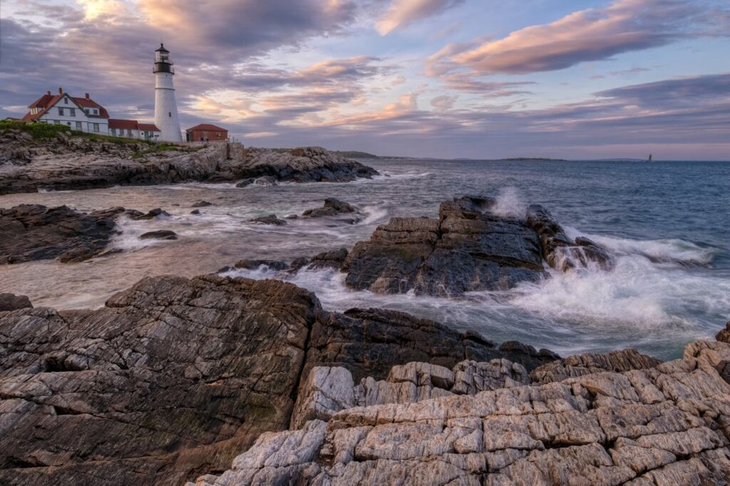 Crashing waves near Portland Head Light along the rugged coast in Cape Elizabeth. 