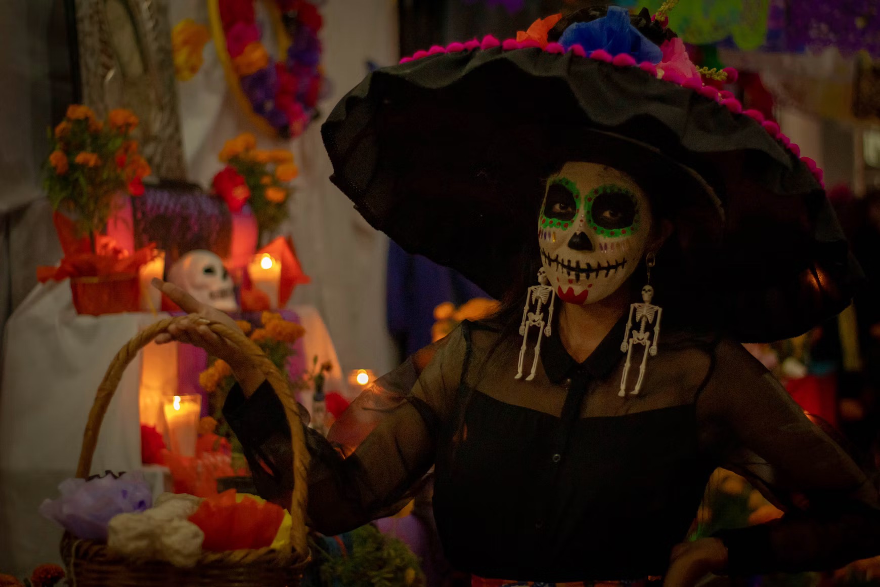 A person in La Catrina makeup for Day of the Dead, a cultural event defining the best time to go to Mexico. 