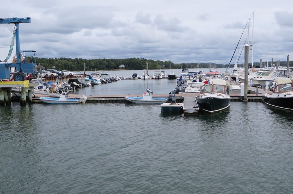 Moored boats and working docks in the bustling, scenic South Freeport harbor area.