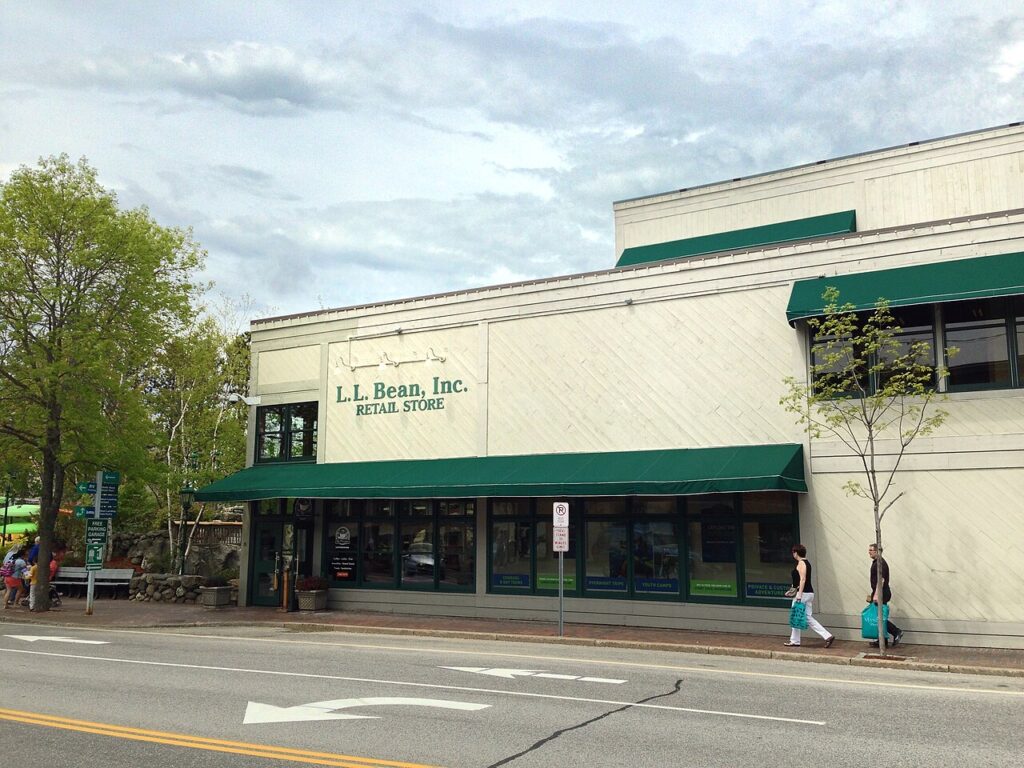 The exterior of the L.L. Bean retail store building with green awnings.