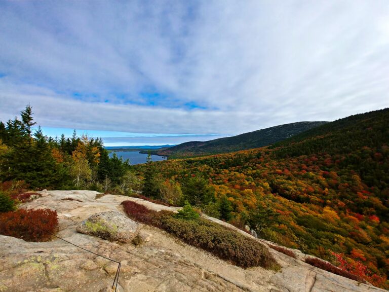Maine in the Fall (2026): The Ultimate Road Trip & Itinerary Guide Rocky overlook in Acadia National Park showing a valley and ocean, representing Maine in fall.