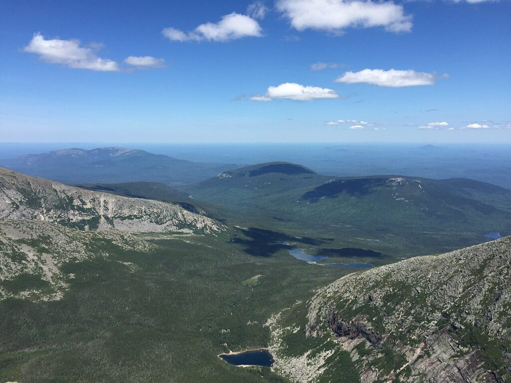 A sweeping view of the wilderness valley from the summit of Mount Katahdin in Baxter State Park. 