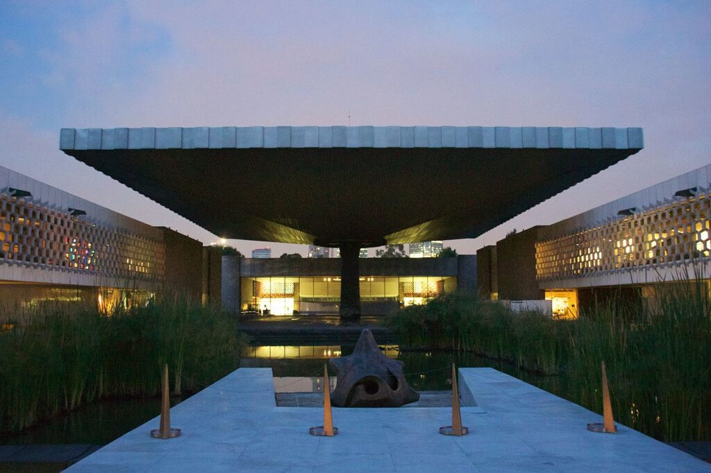 The striking modern architecture and massive umbrella-like roof of the National Museum of Anthropology in Mexico City.