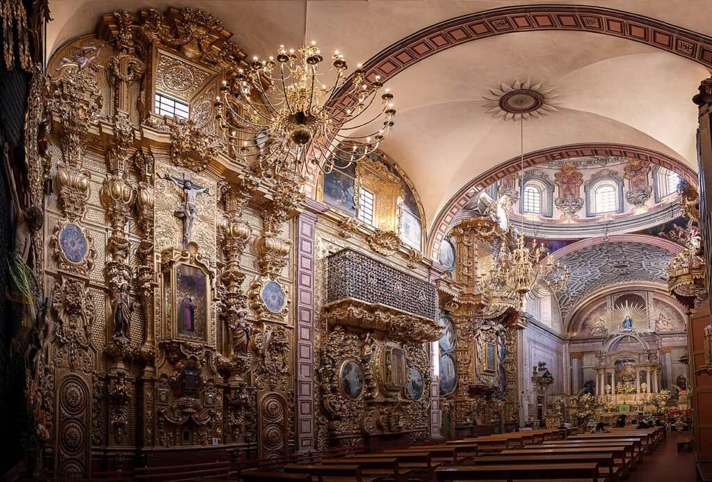The incredibly detailed baroque golden altar inside the Templo de Santa Rosa de Viterbo in Querétaro.