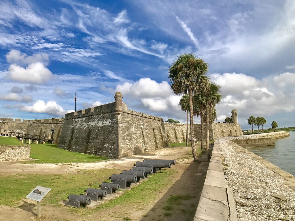 Historic cannons line the seawall outside the stone Castillo de San Marcos.