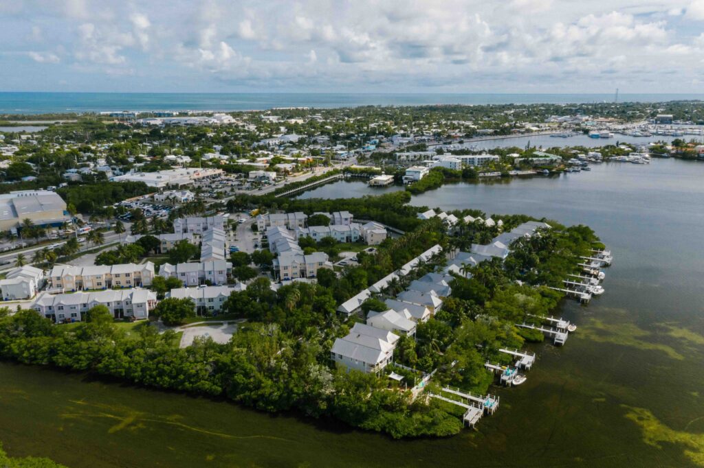 An aerial view of a calm Florida coastal town and its marina.