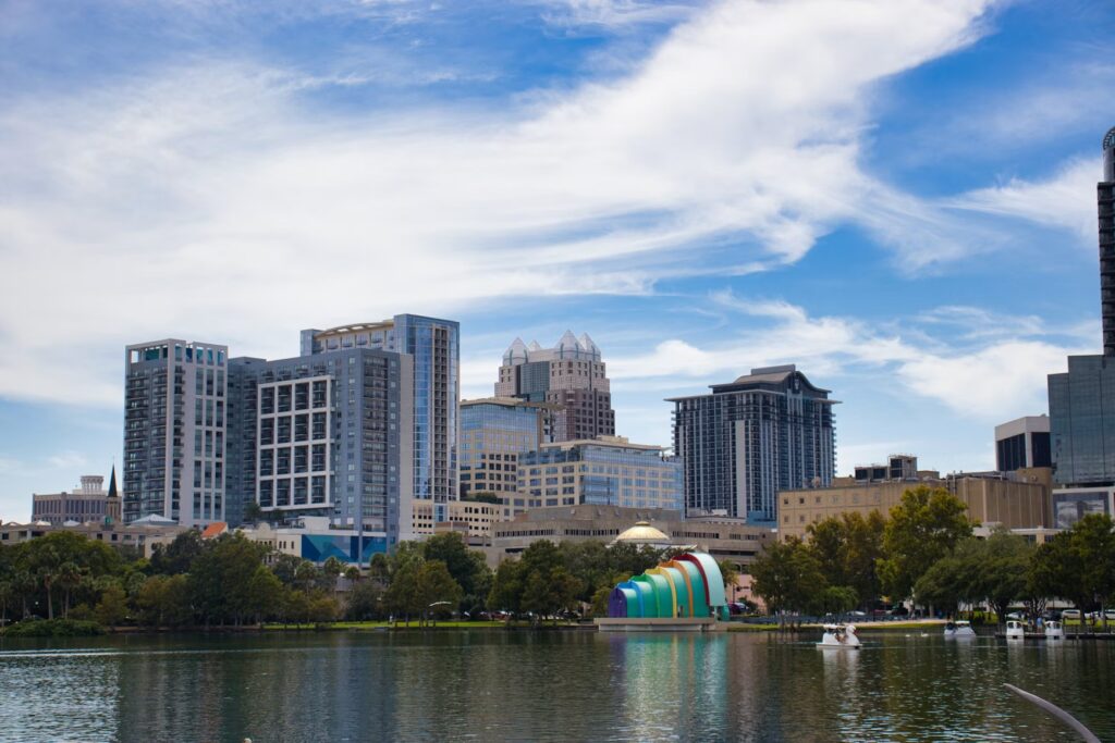 The Orlando city skyline viewed across a lake, a popular year-round destination.