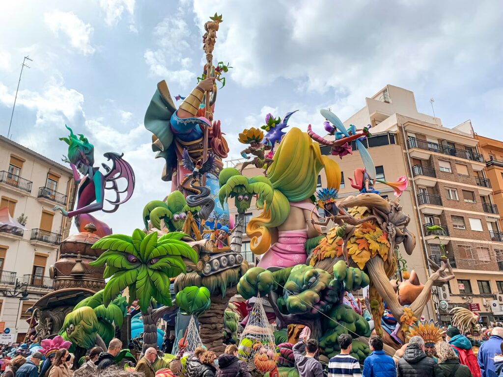 Crowds gathered around giant, colorful sculptures at the Las Fallas festival.