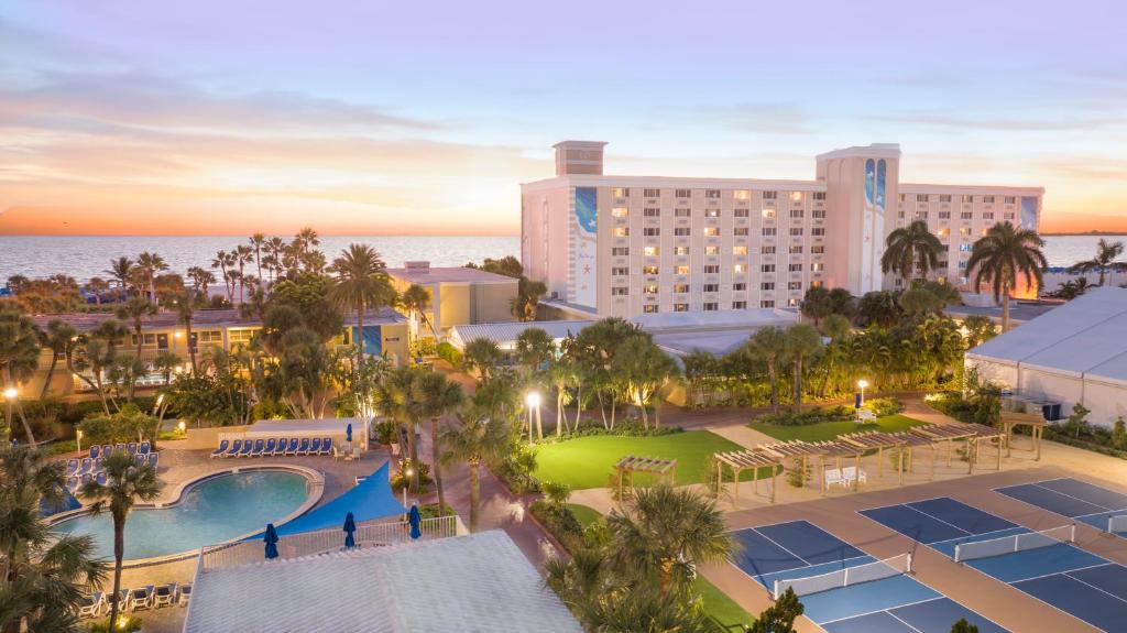 Sunset aerial view of beach resort for florida gulf coast packages.