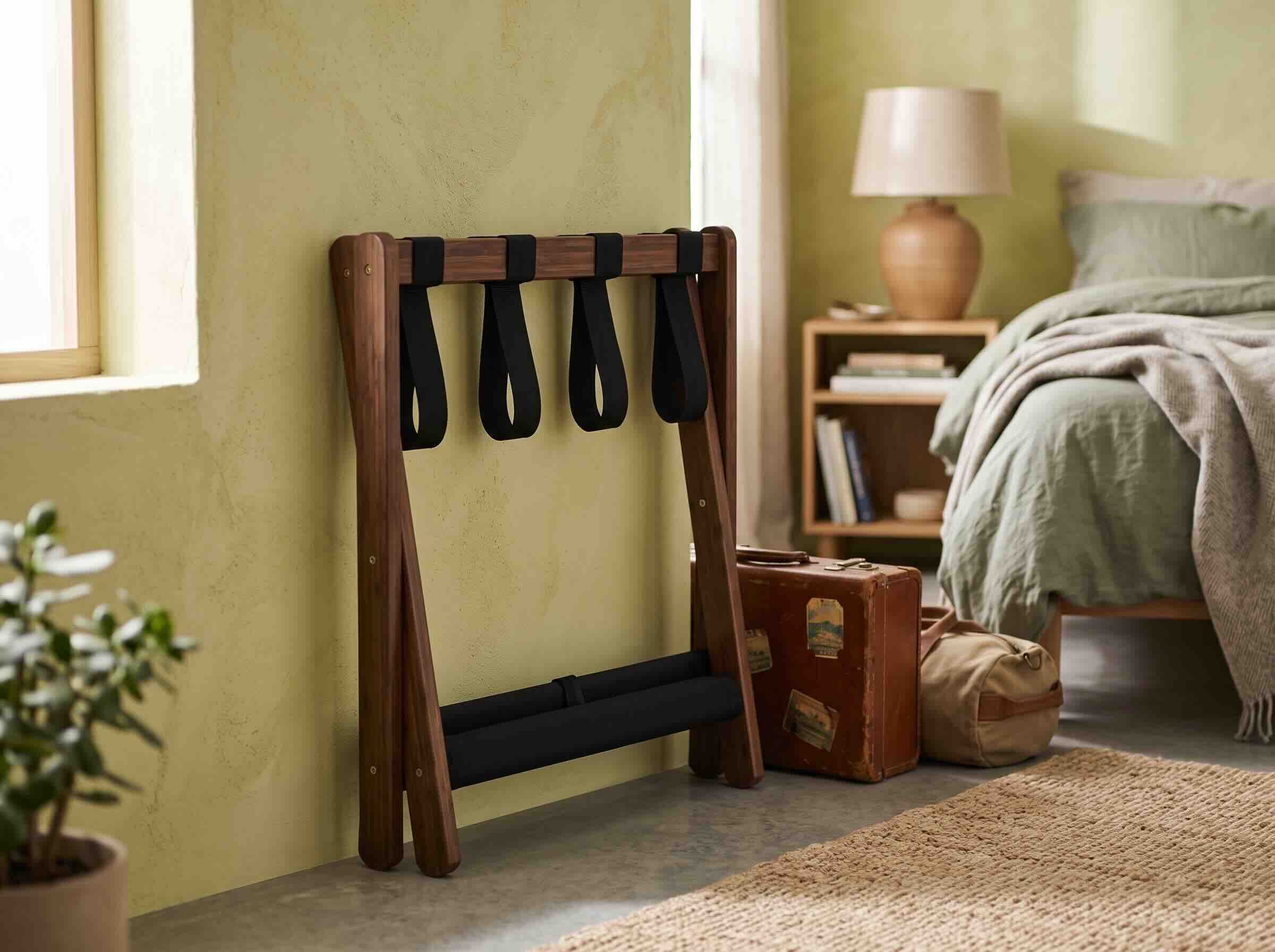 10. Songmics Bamboo Luggage Rack