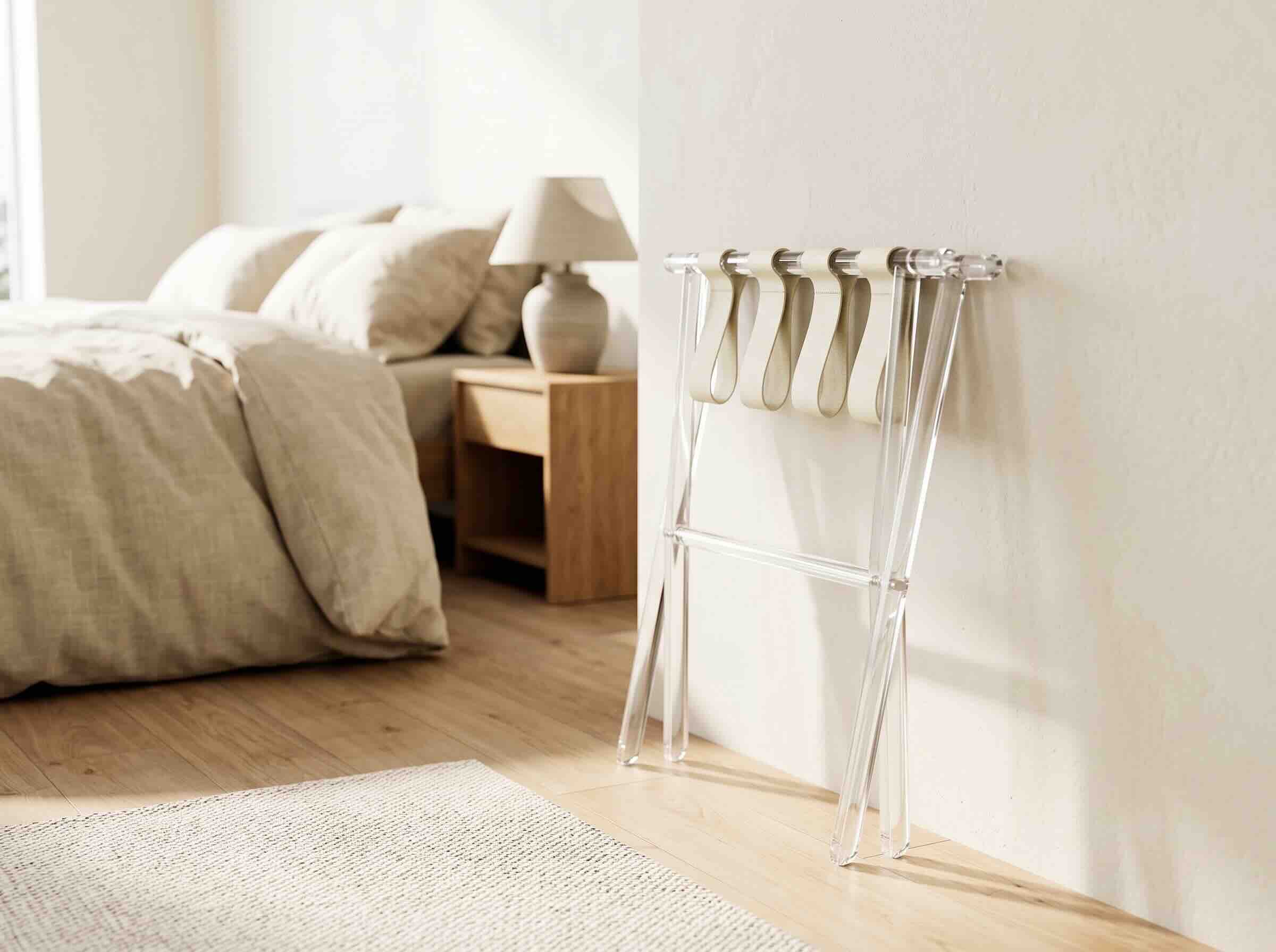 9. Sumerflos Acrylic Luggage Rack