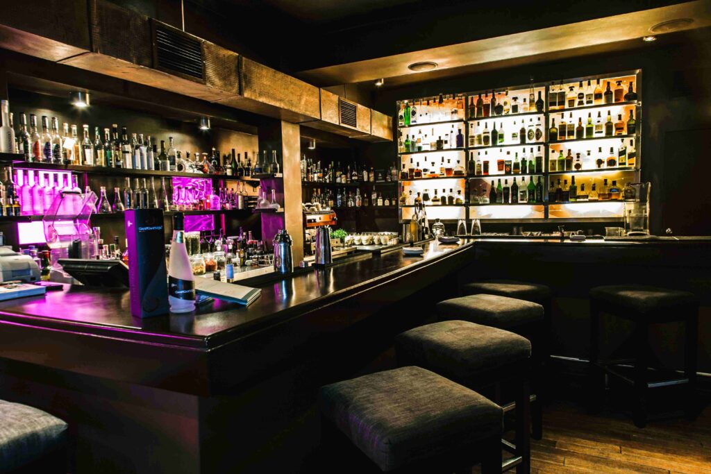Classic wooden bar counter at Antigua Taberna Queirolo, great places to stop by.