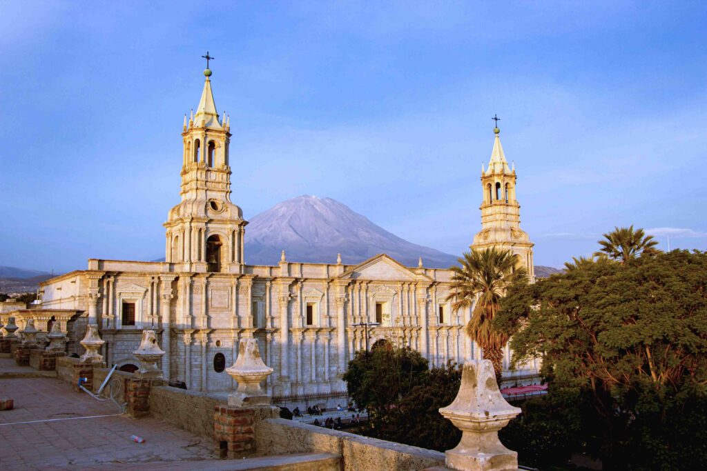 White sillar stone cathedral in Arequipa plaza, representing what Peru is many people know.