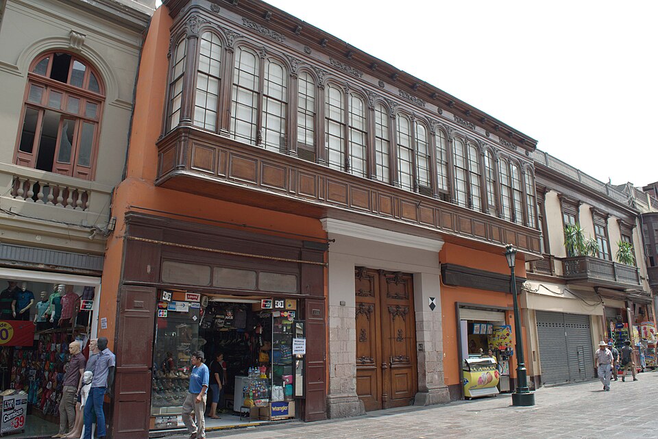 Historic wooden balcony of Casa de Aliaga mansion to visit Lima Peru.