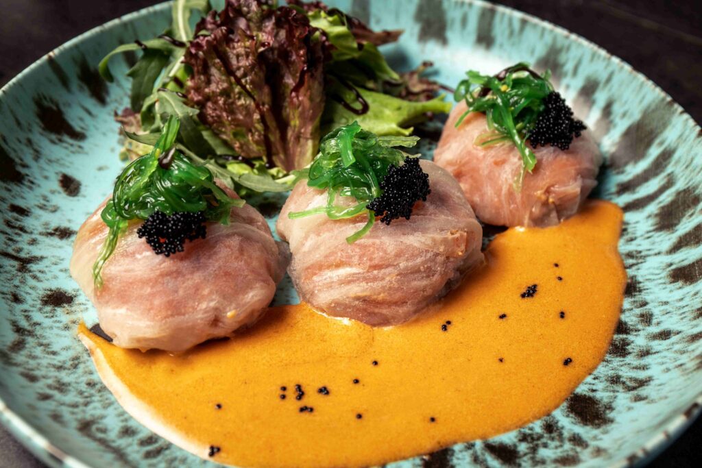 Gourmet Nikkei fine dining dish at Maido for delicious what to do in Lima.
