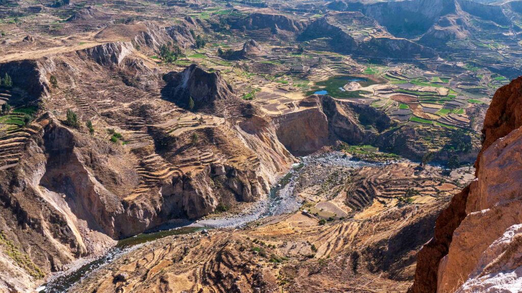 Deep valley and cliffs of Colca Canyon, highlighting cool things about Peru.