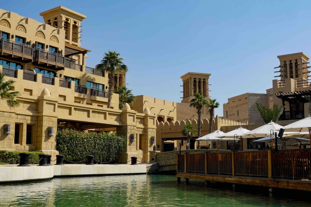 Traditional wind-tower sandstone architecture in Al Fahidi, historic among famous dubai tourist spots.