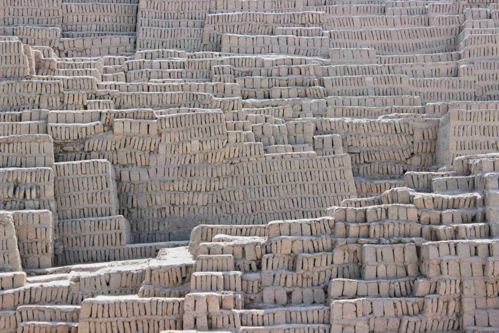 Ancient adobe brick walls of Huaca Pucllana pyramid, top attractions in Lima Peru.